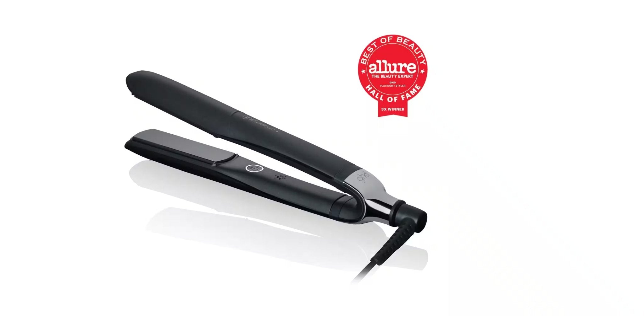A black GHD PLATINUM+ STYLER - 1" FLAT IRON with a red "Allure Best of Beauty Hall of Fame" award badge against a white background, this smart styler offers personalized styling and the ability to create perfect flat iron waves.