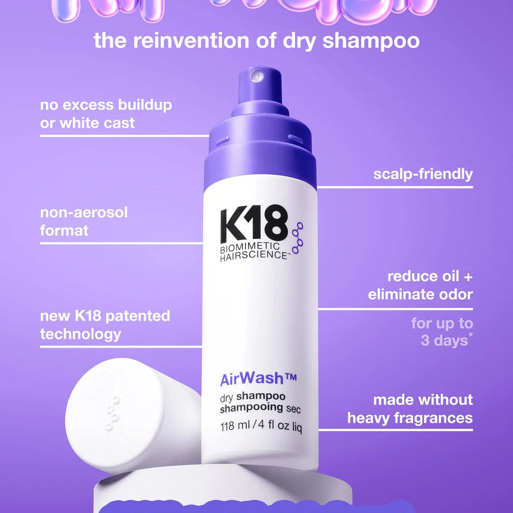 A bottle of Simply Colour Hair Salon Studio & Online Store K18 AirWash Dry Shampoo showcases its features: no residue, non-aerosol, patented odorBIND biotechnology, scalp-friendly, reduces oil, made without heavy fragrances, 100% user satisfaction.