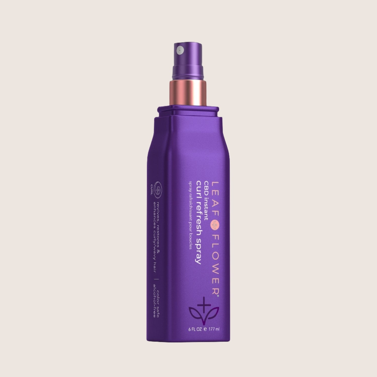 A purple bottle of Leaf and Flower CBD Instant Curl Refresh Spray, a vegan curl activator with a nozzle, holding 6 fl oz (177 ml).